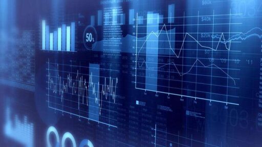 A blurry image of business graphs and data.