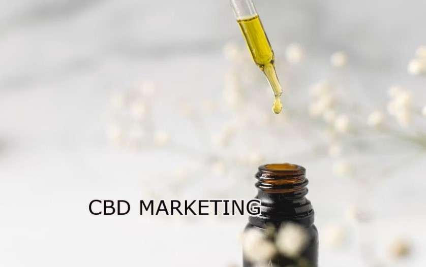 A bottle of cbd oil with the words cbd marketing.