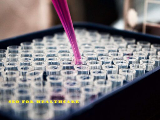 A person is pouring a pink liquid into a test tube.
